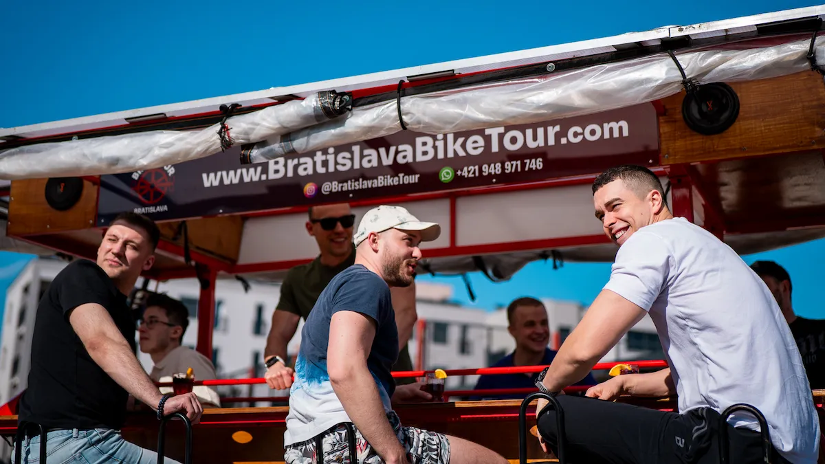 Friends enjoying a ride with Bratislava Bike Tour in Bratislava